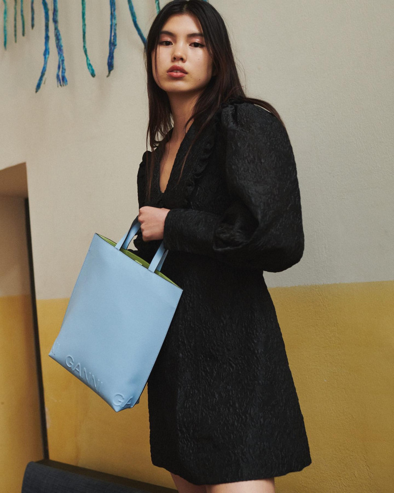 Maggie Yu featured in  the Ganni advertisement for Winter 2021