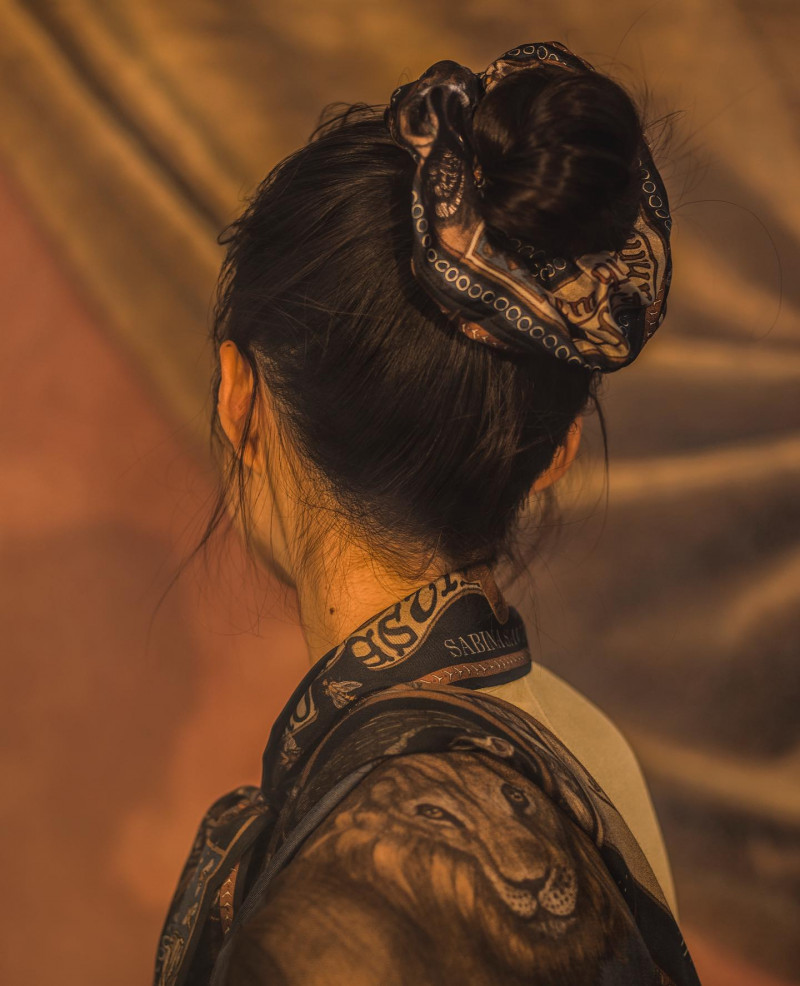 Maggie Yu featured in  the Sabina Savage advertisement for Autumn/Winter 2021
