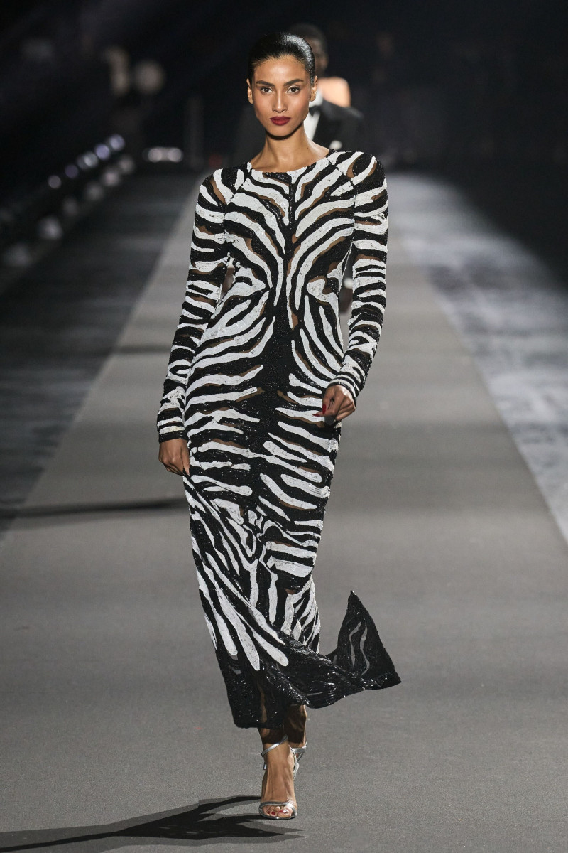 Imaan Hammam featured in  the Luisaviaroma Runway Icons fashion show for Autumn/Winter 2023