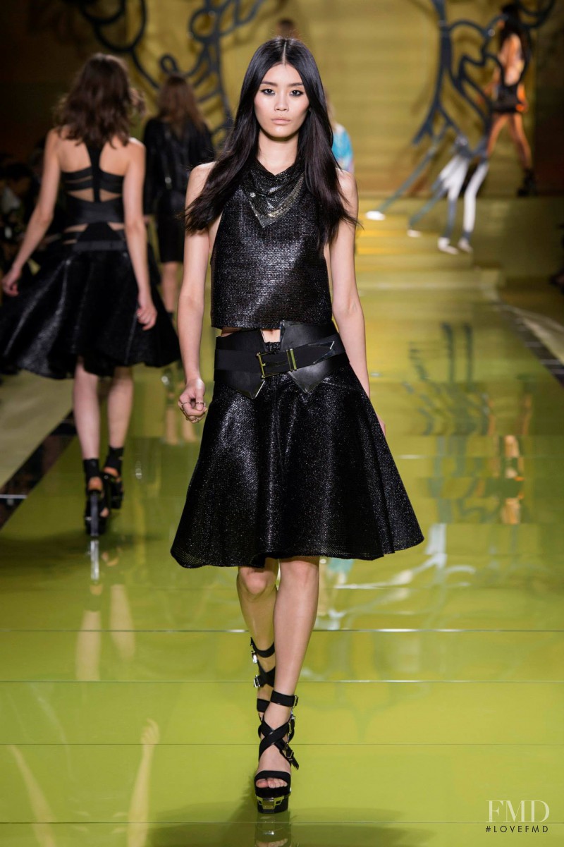 Ming Xi featured in  the Versace fashion show for Spring/Summer 2014