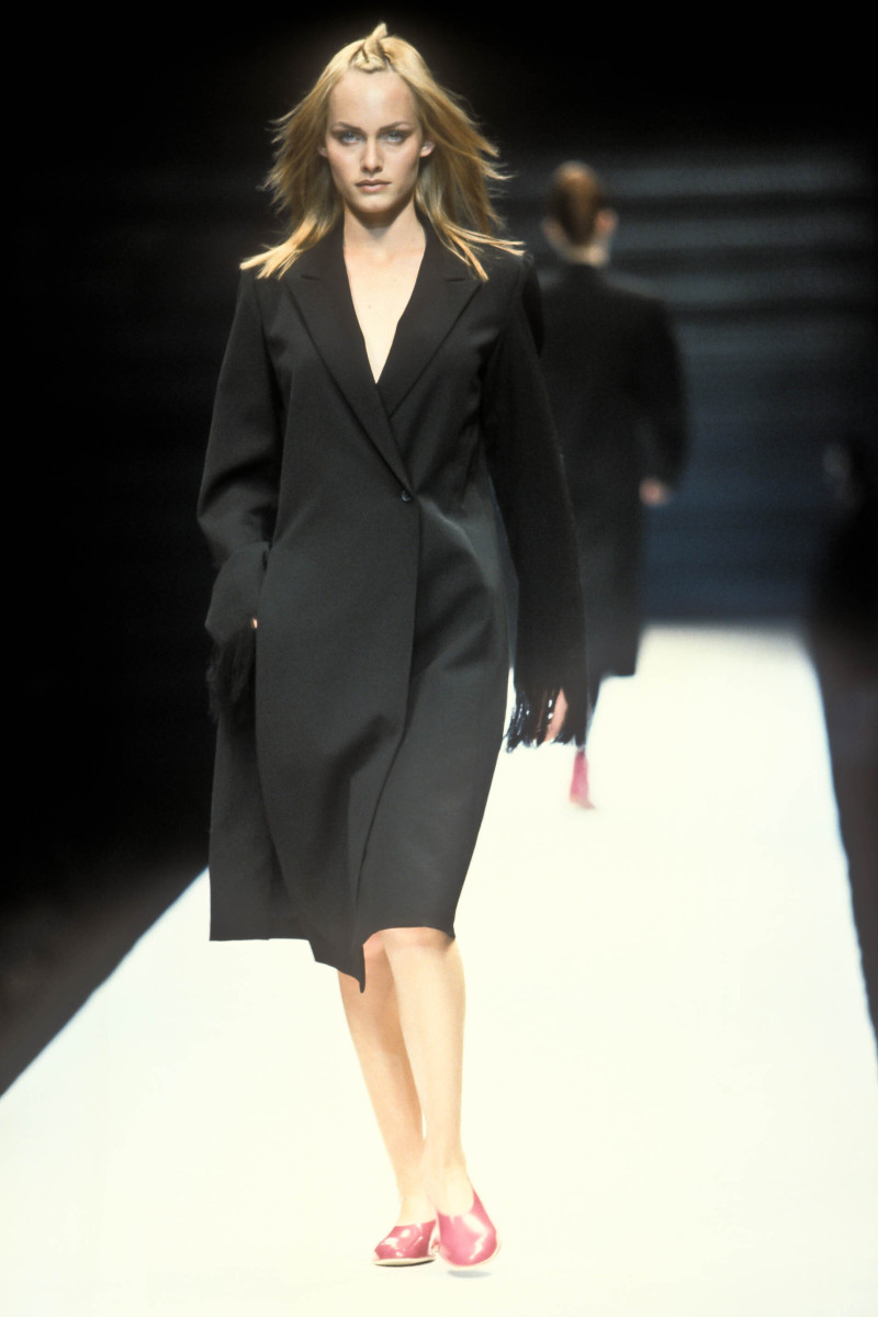Amber Valletta featured in  the Yohji Yamamoto fashion show for Autumn/Winter 1996