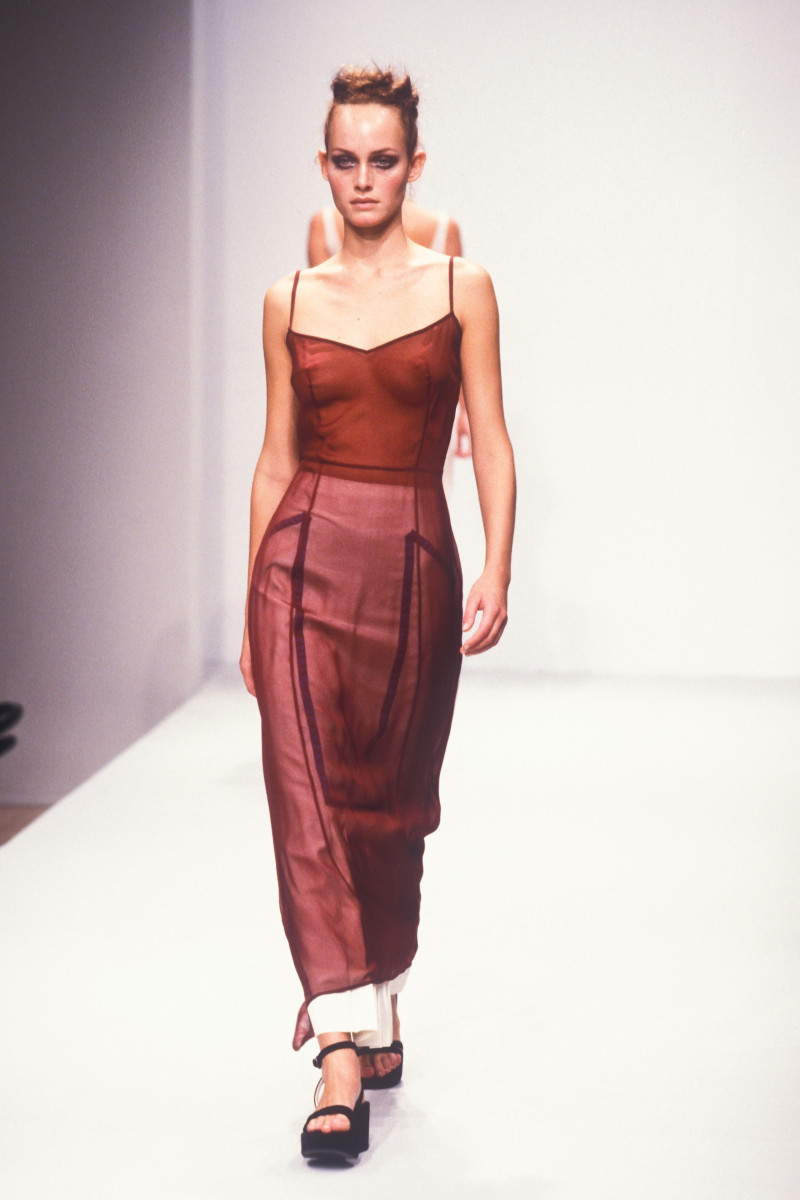 Amber Valletta featured in  the Prada fashion show for Spring/Summer 1997