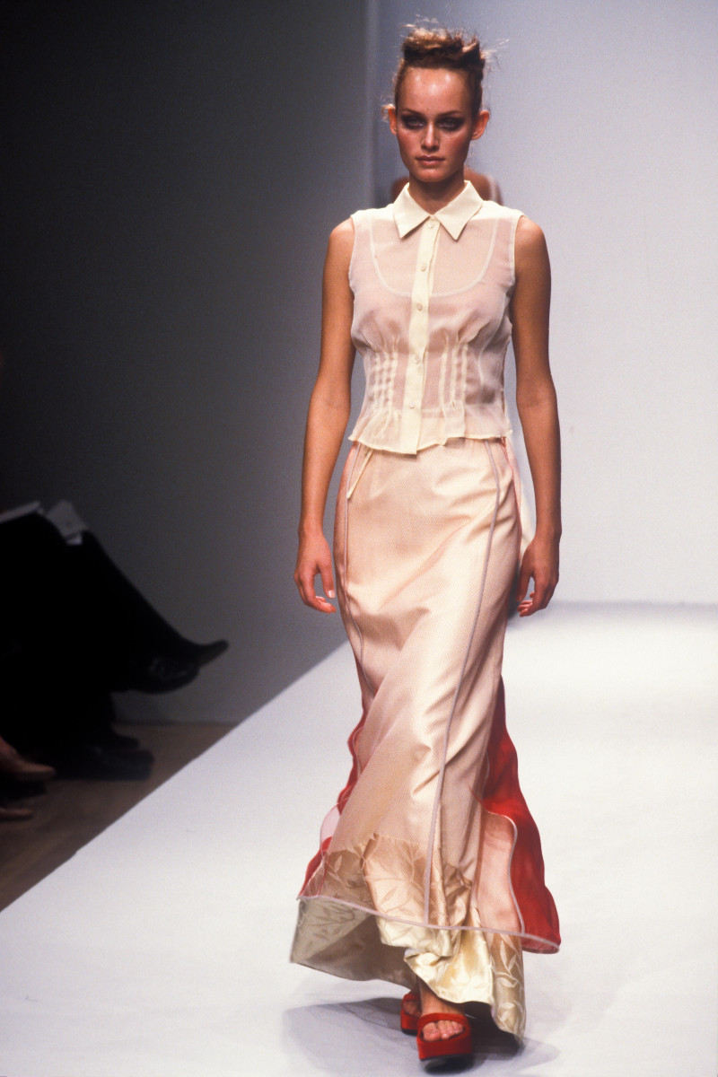 Amber Valletta featured in  the Prada fashion show for Spring/Summer 1997