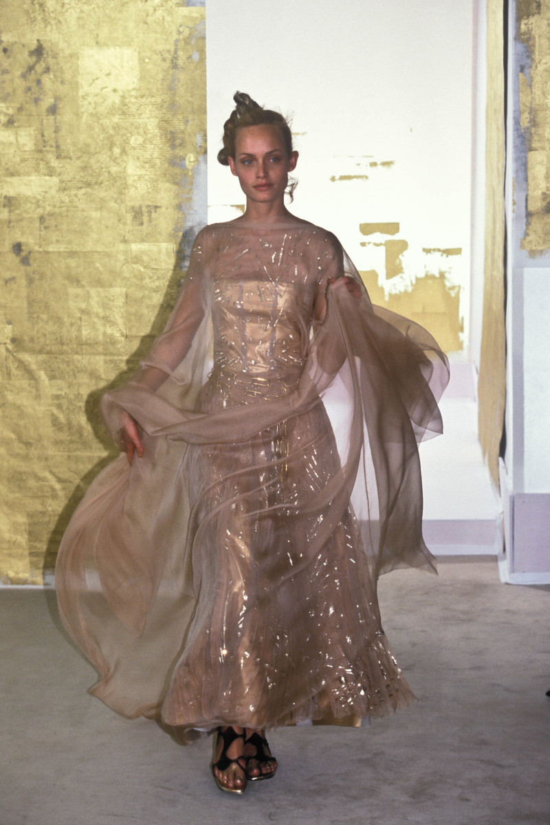 Amber Valletta featured in  the Chanel Haute Couture fashion show for Autumn/Winter 1998