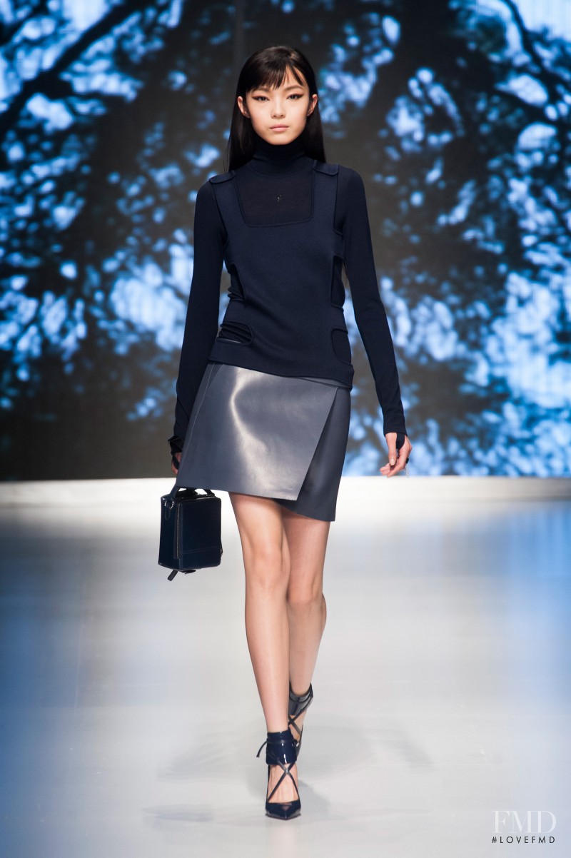 Xiao Wen Ju featured in  the Salvatore Ferragamo fashion show for Autumn/Winter 2013