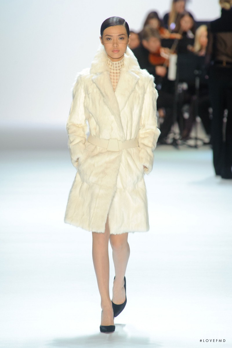 Tian Yi featured in  the Akris fashion show for Autumn/Winter 2013