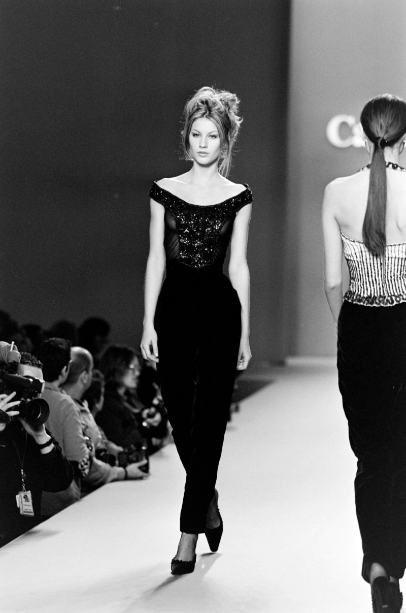 Gisele Bundchen featured in  the Carolina Herrera fashion show for Autumn/Winter 1996