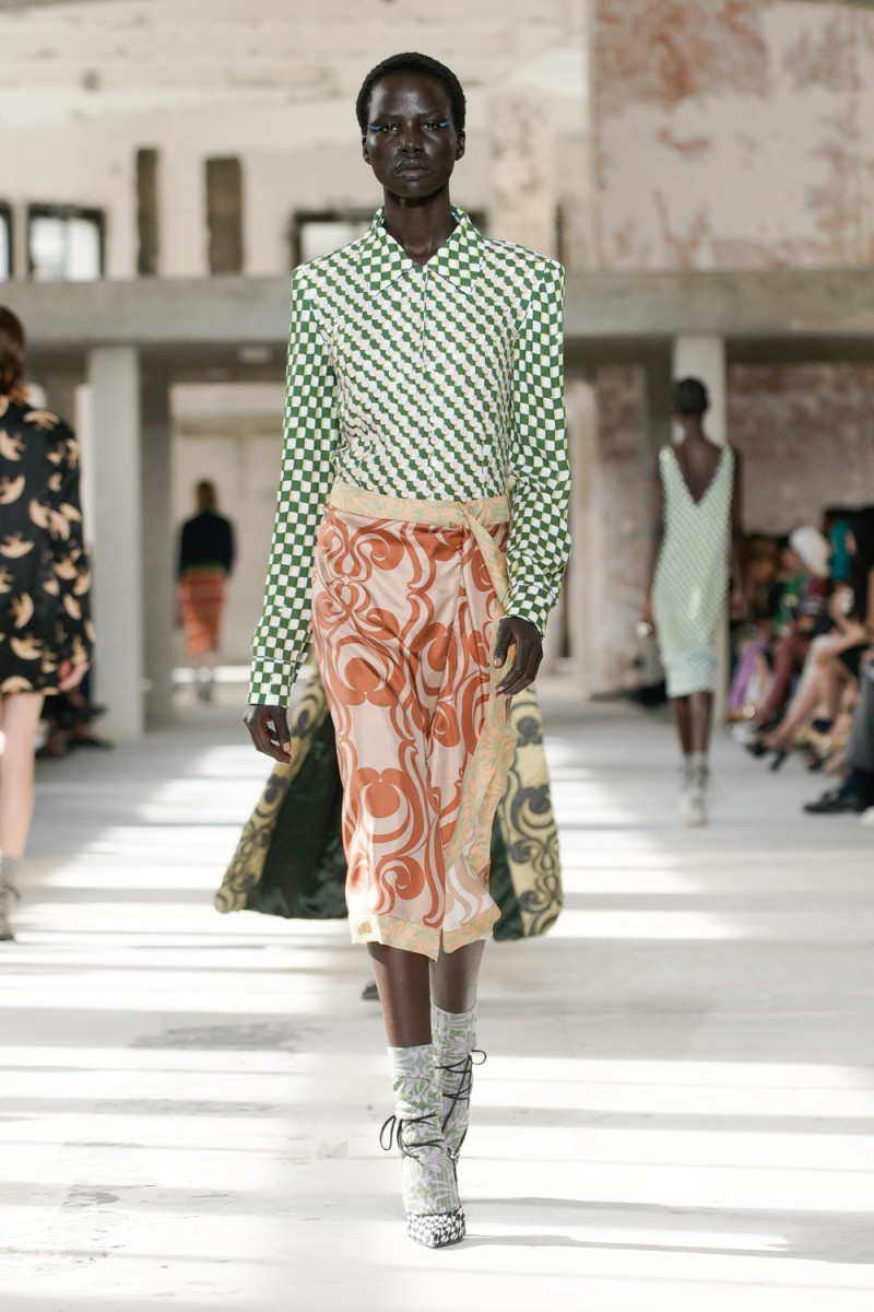 Naomi Apajok featured in  the Dries van Noten fashion show for Spring/Summer 2024