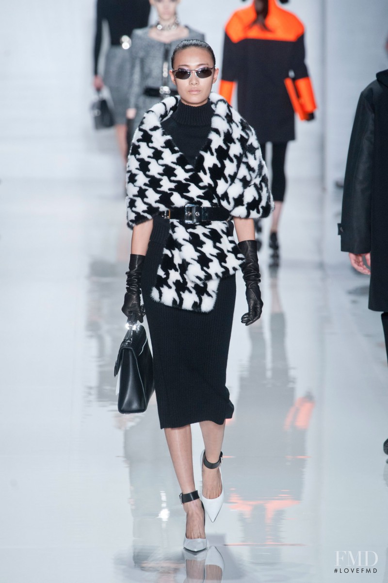Shu Pei featured in  the Michael Kors Collection fashion show for Autumn/Winter 2013