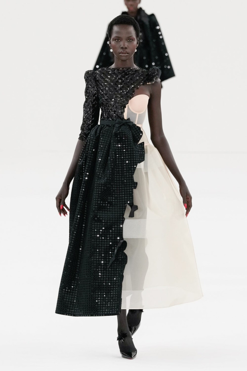 Naomi Apajok featured in  the Viktor & Rolf fashion show for Spring/Summer 2024