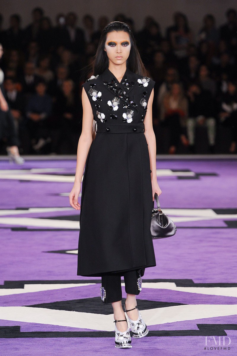 Tian Yi featured in  the Prada fashion show for Autumn/Winter 2012