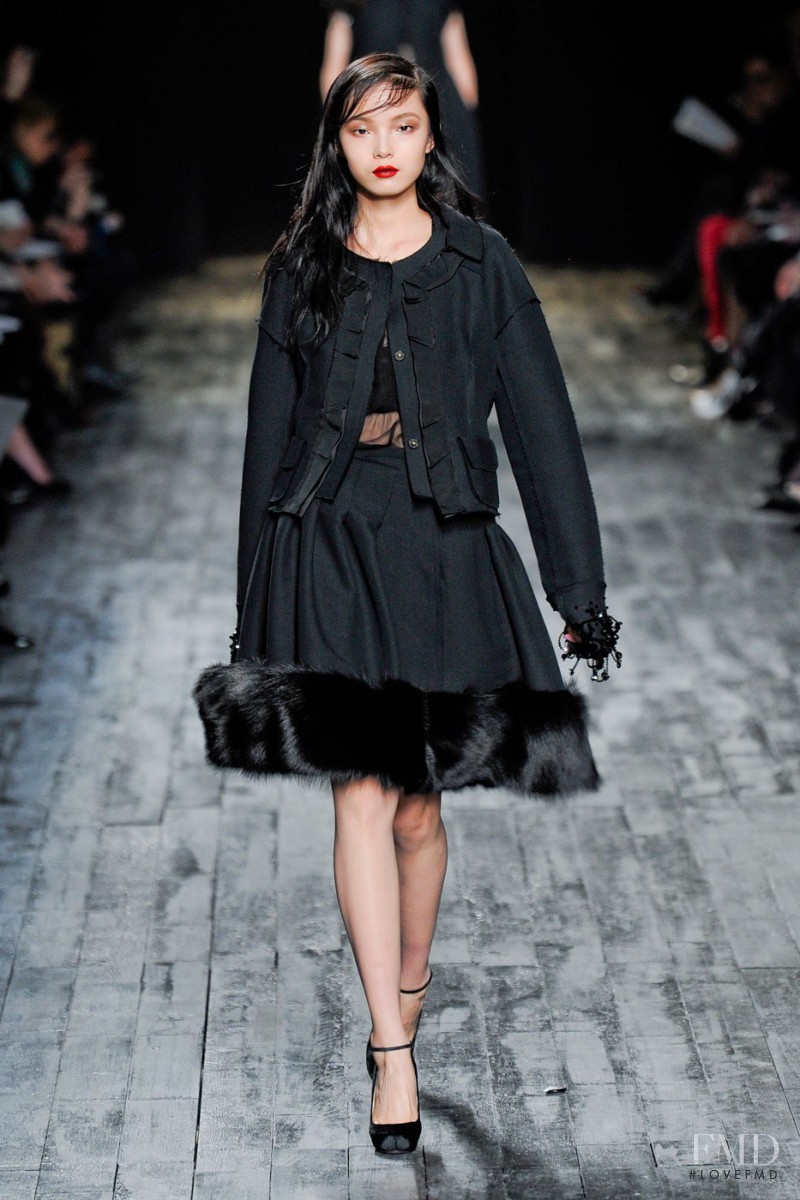 Xiao Wen Ju featured in  the Nina Ricci fashion show for Autumn/Winter 2012