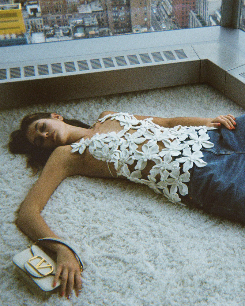 Kaia Gerber featured in  the Valentino Garavani advertisement for Spring 2024
