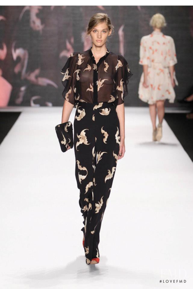 Irina Nikolaeva featured in  the Vivienne Tam fashion show for Spring/Summer 2012