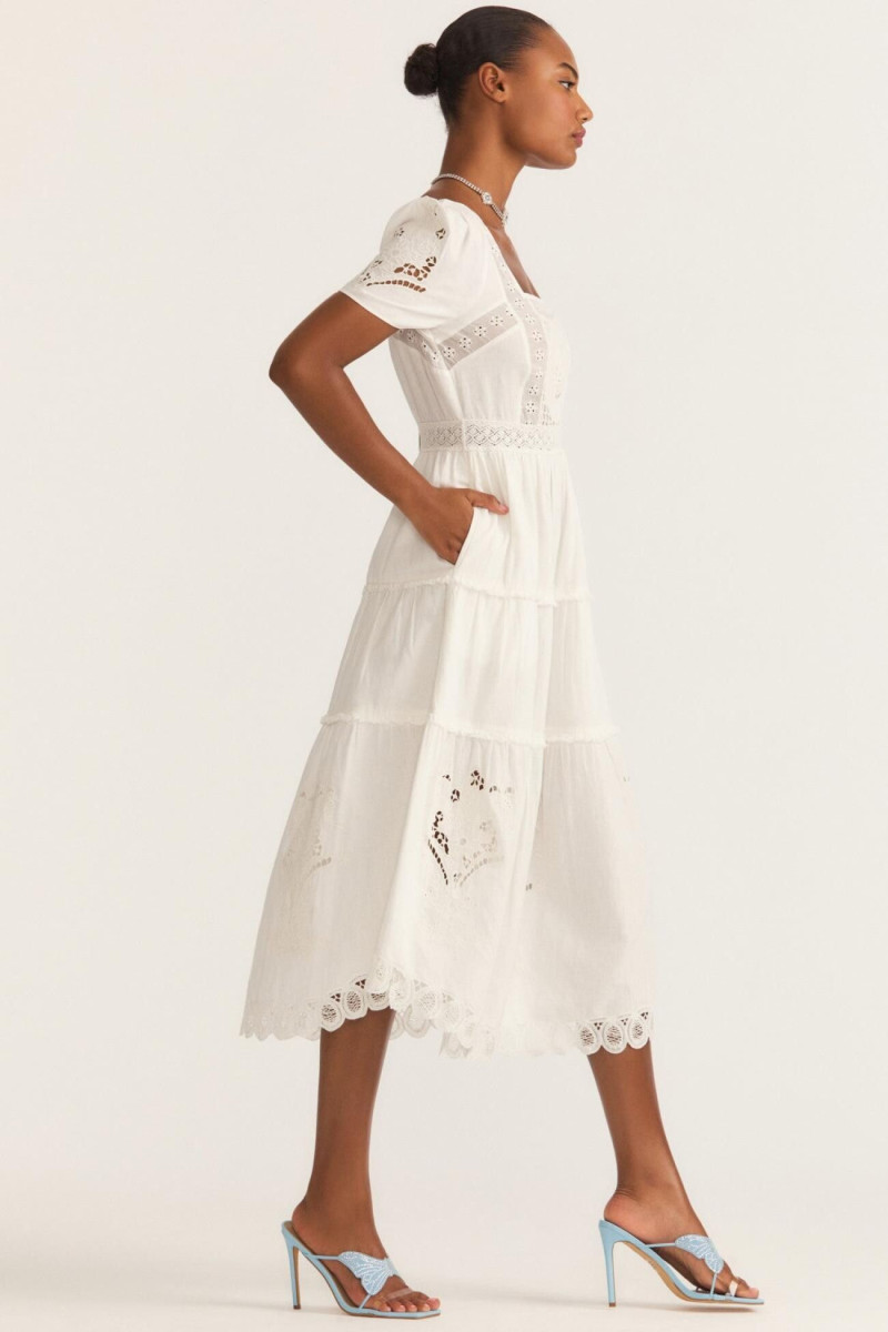 Ange-Marie Moutambou featured in  the LoveShackFancy catalogue for Spring/Summer 2024