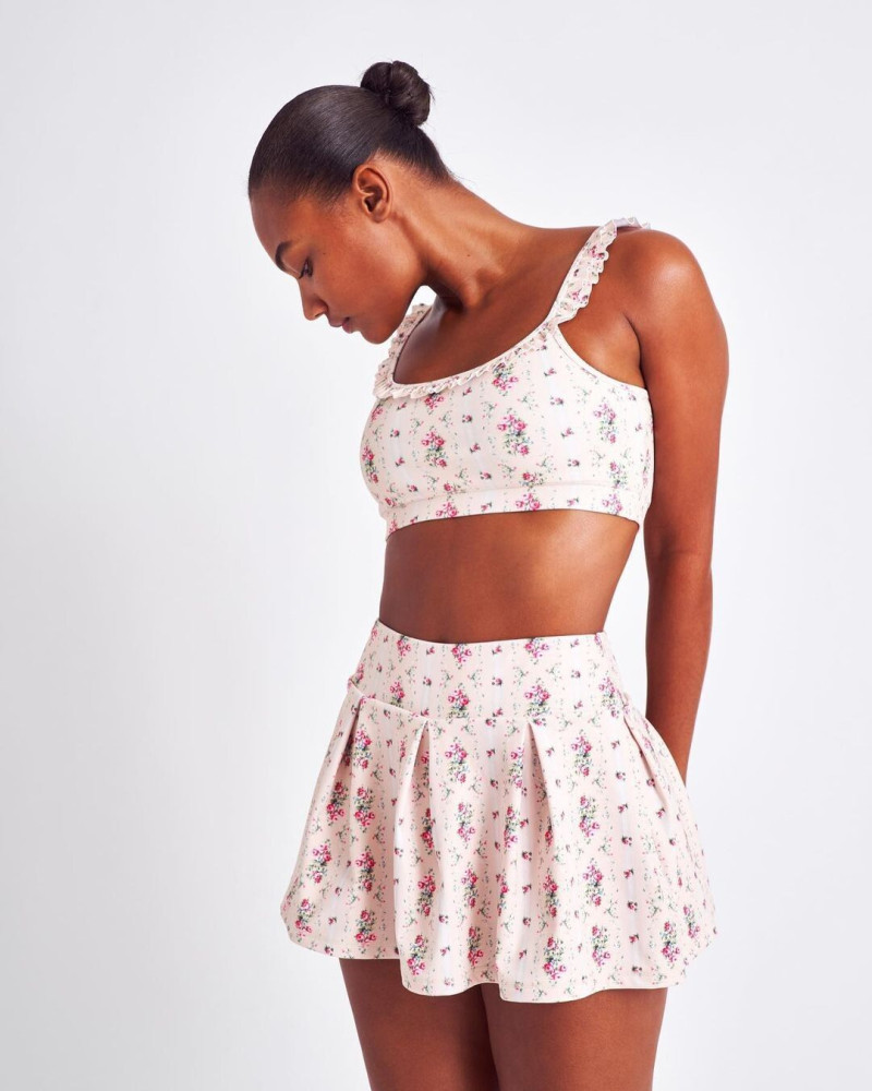 Ange-Marie Moutambou featured in  the LoveShackFancy catalogue for Spring/Summer 2024