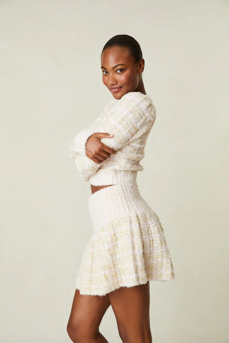 Ange-Marie Moutambou featured in  the LoveShackFancy catalogue for Spring/Summer 2024