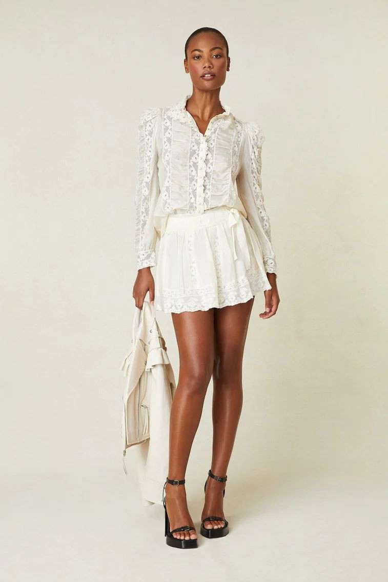 Ange-Marie Moutambou featured in  the LoveShackFancy catalogue for Spring/Summer 2024