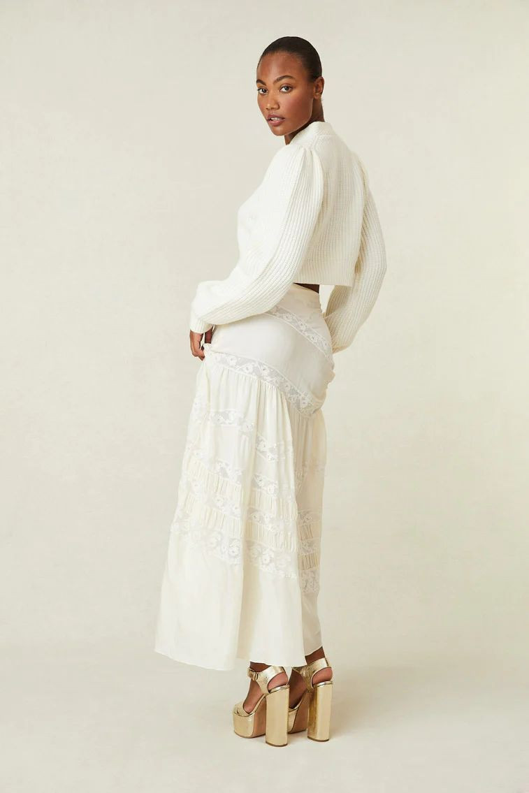 Ange-Marie Moutambou featured in  the LoveShackFancy catalogue for Spring/Summer 2024