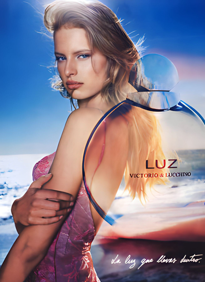 Karolina Kurkova featured in  the Victorio & Lucchino Luz Bride Limited Edition advertisement for Spring/Summer 2003