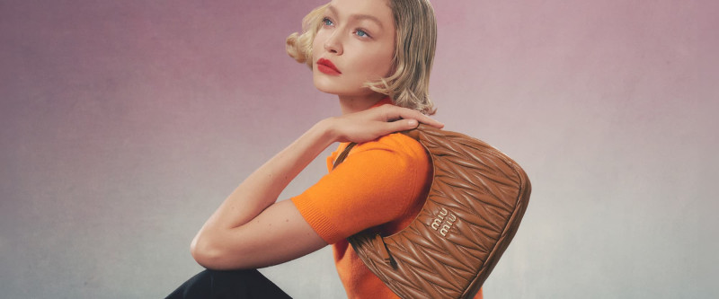Gigi Hadid featured in  the Miu Miu Miu Miu Wander Handbag 2024 Campaign advertisement for Spring/Summer 2024