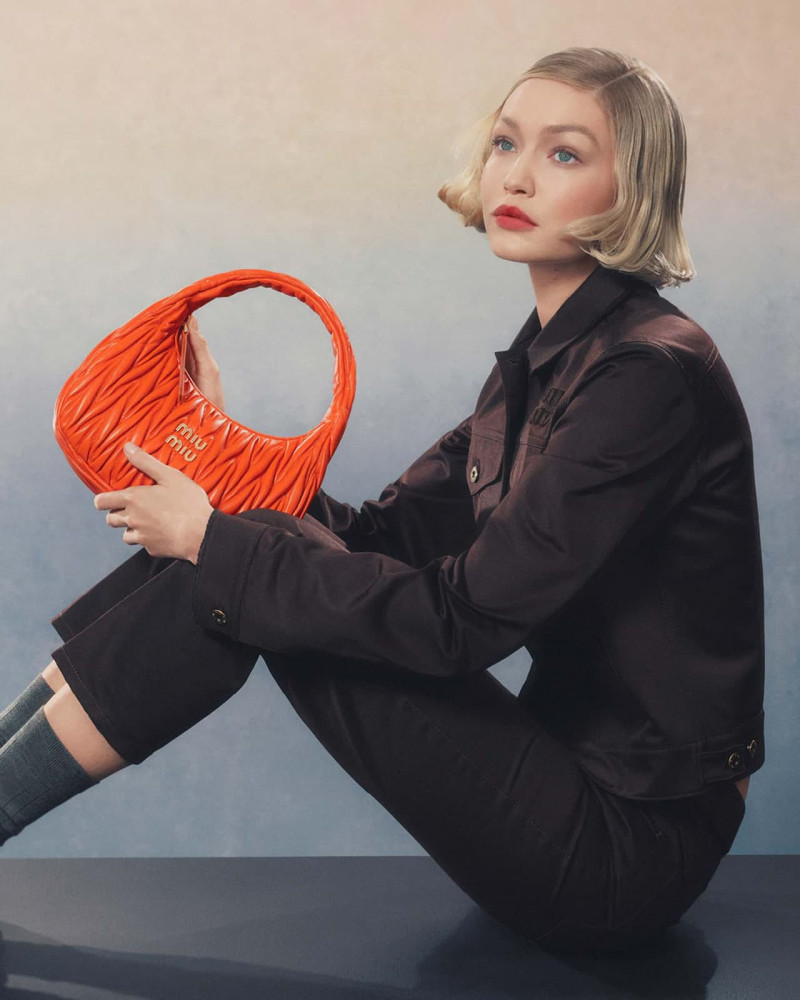 Gigi Hadid featured in  the Miu Miu Miu Miu Wander Handbag 2024 Campaign advertisement for Spring/Summer 2024