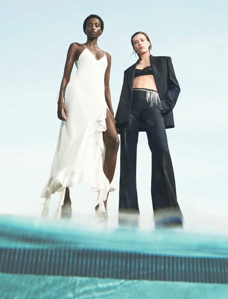 Anok Yai featured in  the Mango Victoria Beckham x Mango 2024 Campaign advertisement for Summer 2024