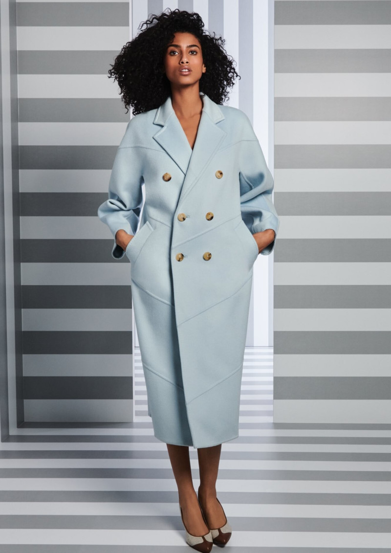 Imaan Hammam featured in  the Holt Renfrew advertisement for Spring/Summer 2024