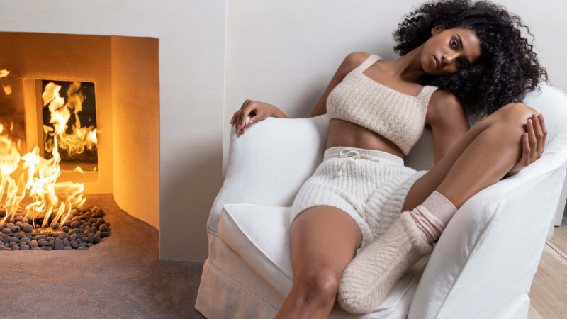 Imaan Hammam featured in  the Loro Piana ‘Cocooning’ Collection advertisement for Autumn/Winter 2022