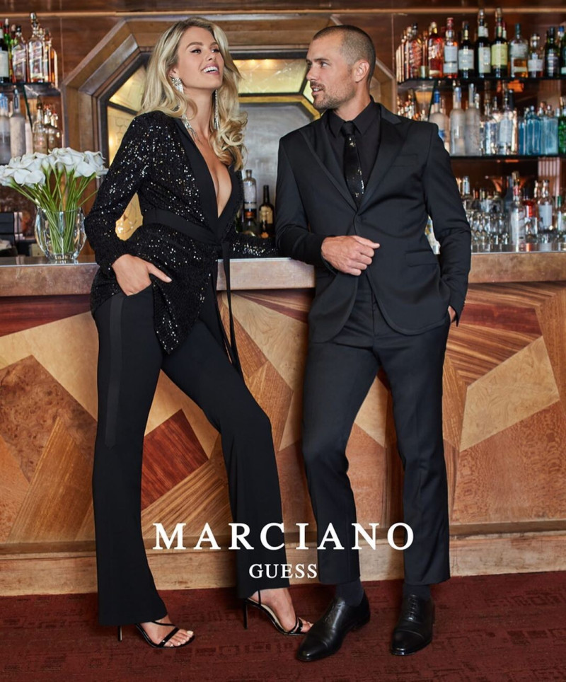 Natalie Jayne Roser featured in  the Guess by Marciano advertisement for Holiday 2019