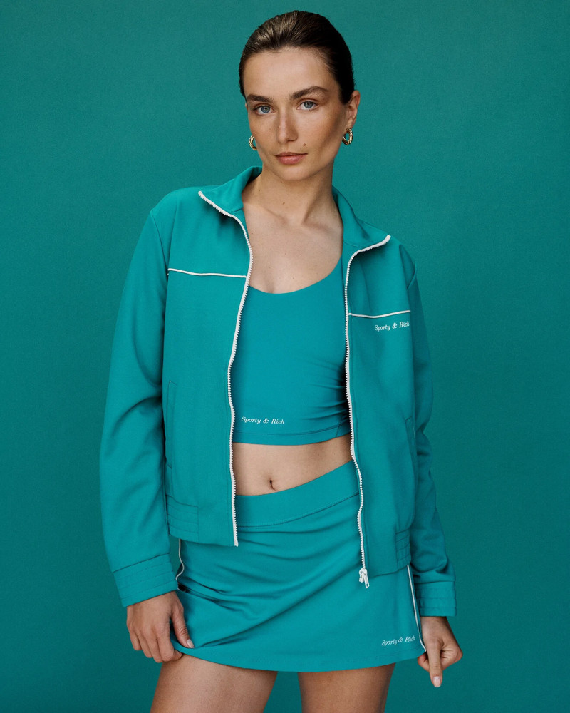 Andreea Diaconu featured in  the Sporty & Rich Tennis Capsule advertisement for Autumn/Winter 2022