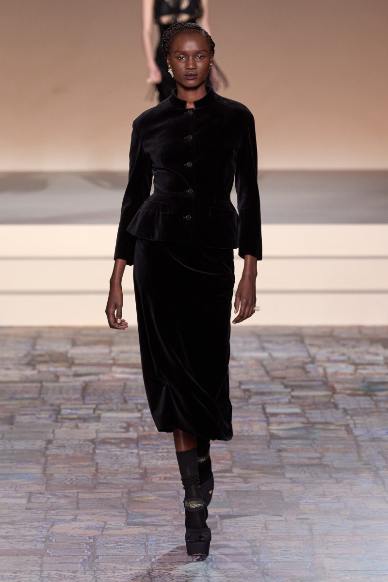 Abeny Nhial featured in  the Christian Dior fashion show for Pre-Fall 2024