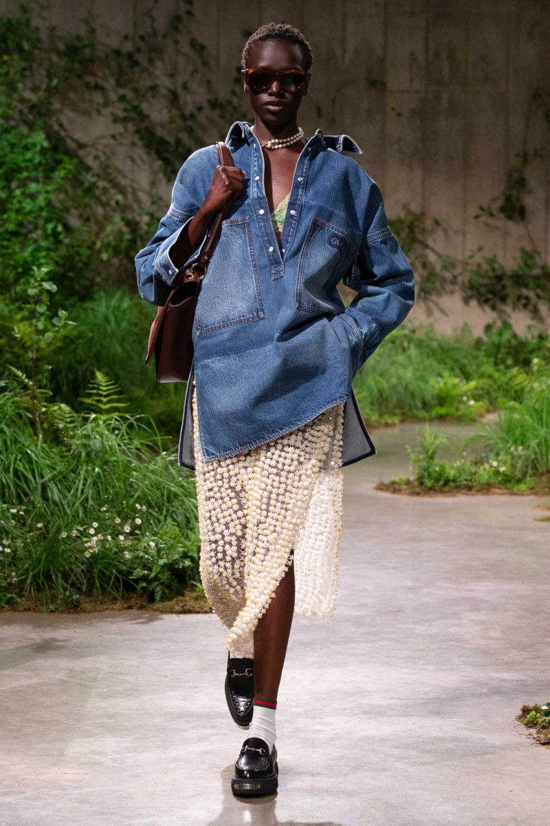 Nyajuok Gatdet featured in  the Gucci fashion show for Cruise 2025