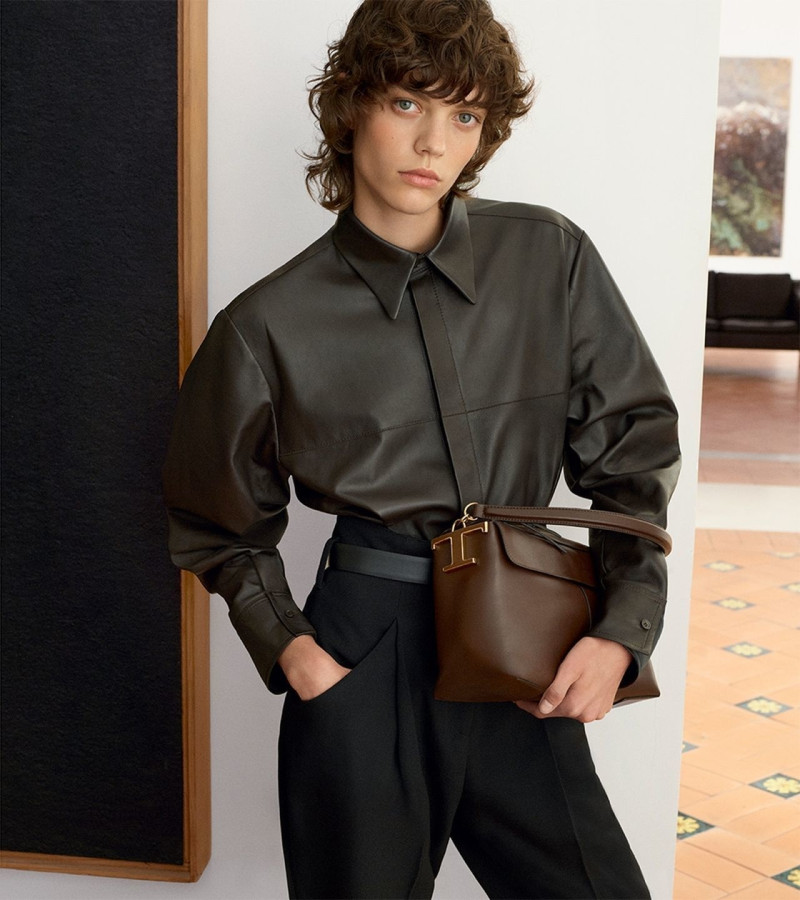 Alix Bouthors featured in  the Tod\'s s Fall Winter 2023-2024 campaign advertisement for Autumn/Winter 2023