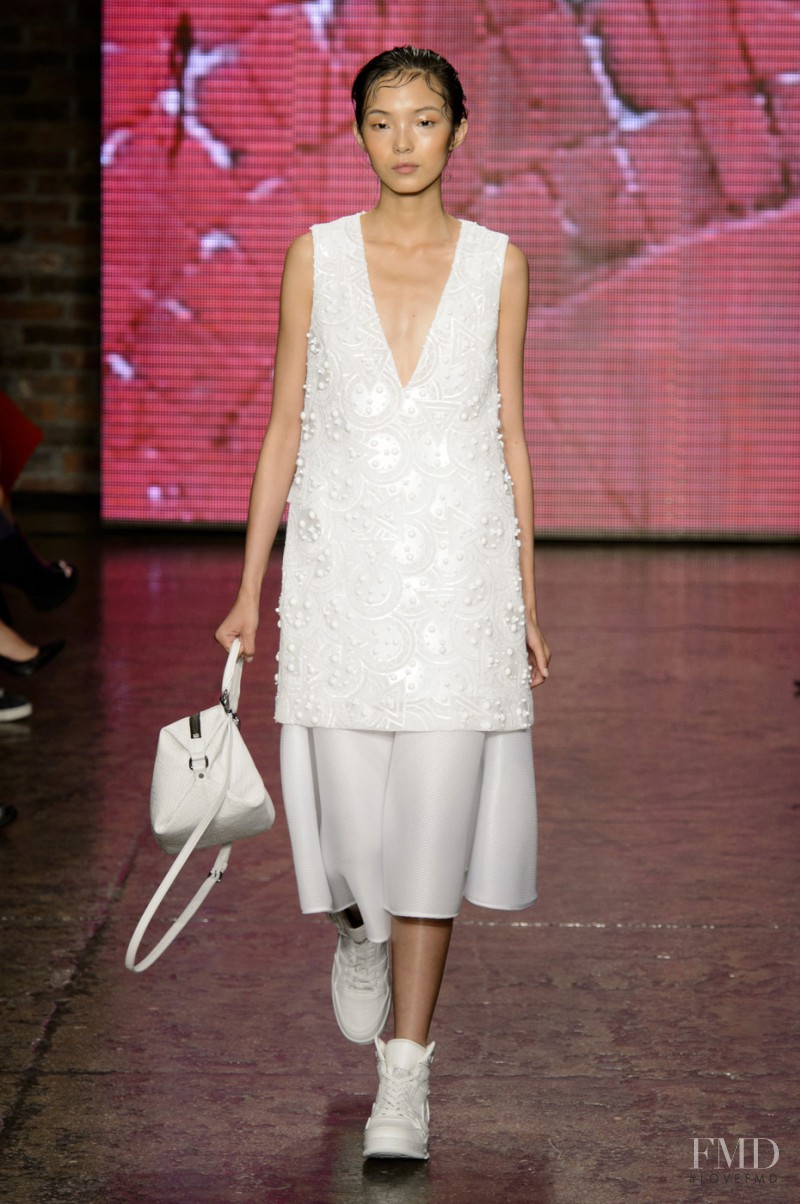 Xiao Wen Ju featured in  the DKNY fashion show for Spring/Summer 2015