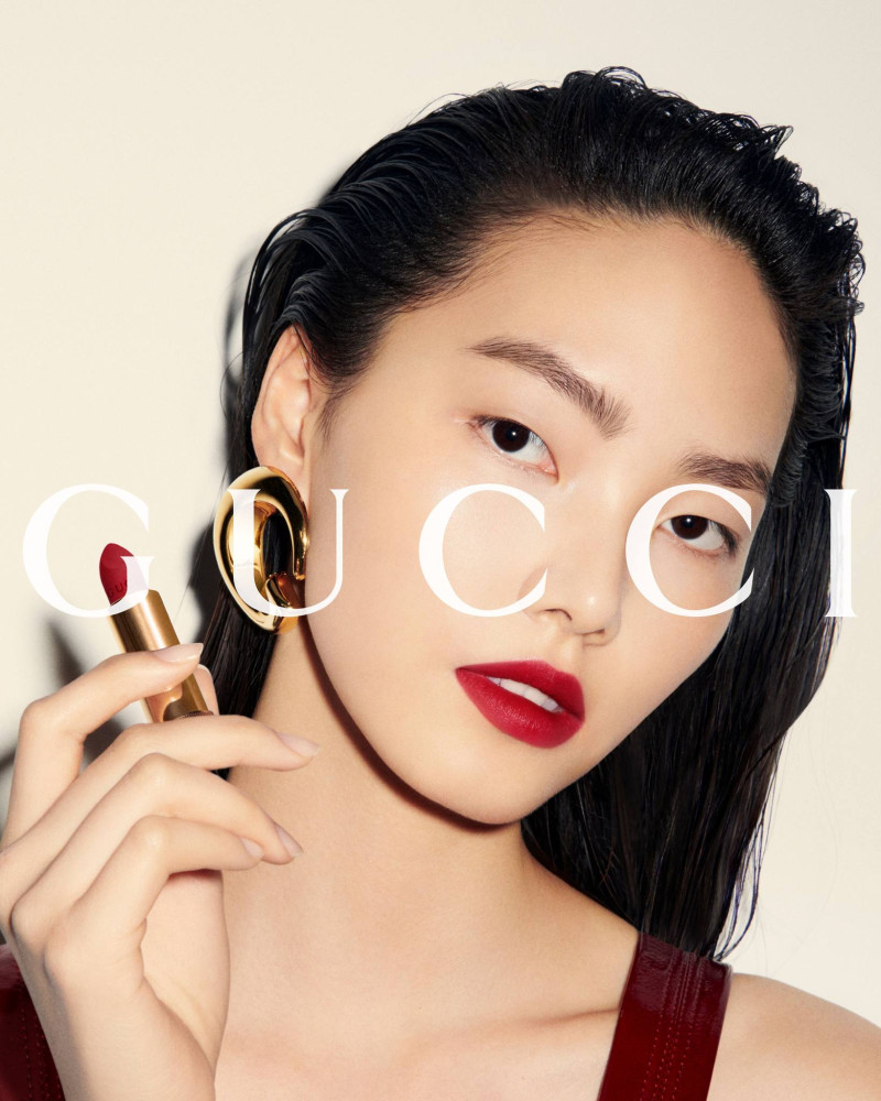 Jiahui Zhang featured in  the Gucci Beauty Gucci Rosso Ancora 2024 Campaign advertisement for Summer 2024