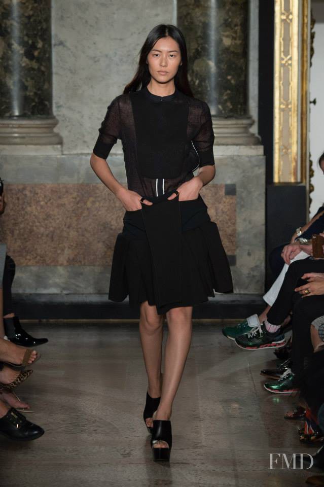 Liu Wen featured in  the Ports 1961 fashion show for Spring/Summer 2015