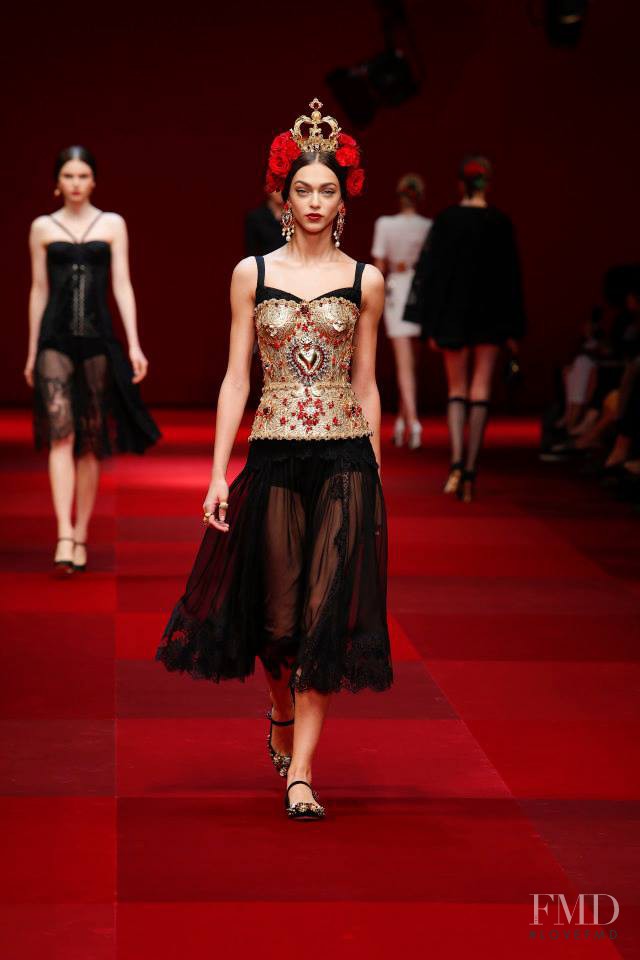 Zhenya Katava featured in  the Dolce & Gabbana fashion show for Spring/Summer 2015