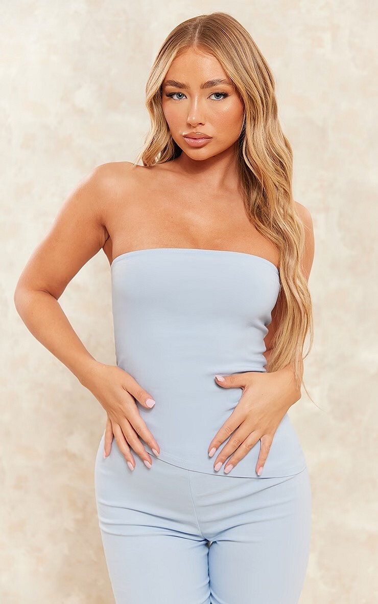Amber Jepson featured in  the PrettyLittleThing catalogue for Spring/Summer 2023