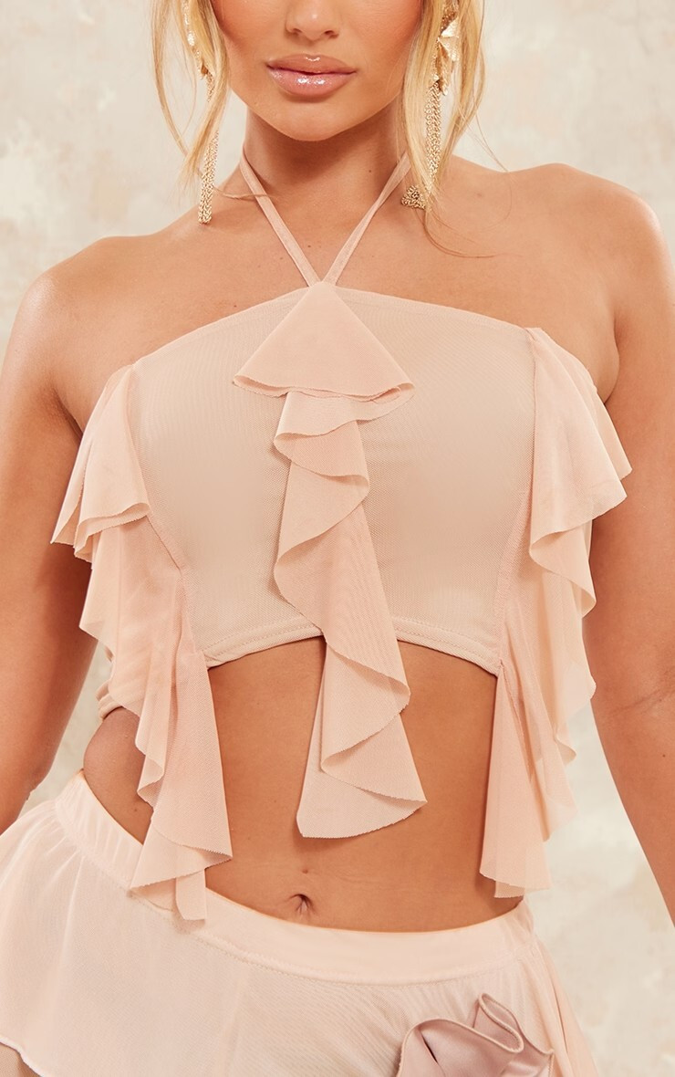 Amber Jepson featured in  the PrettyLittleThing catalogue for Spring/Summer 2023
