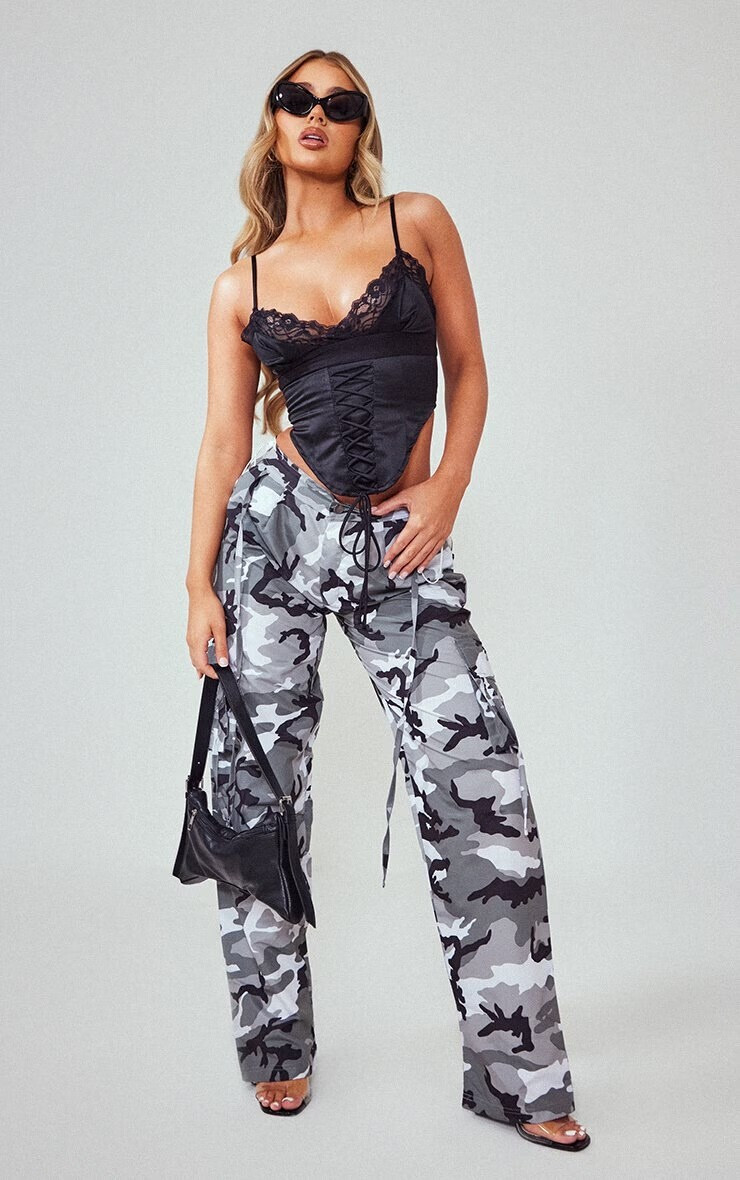 Amber Jepson featured in  the PrettyLittleThing catalogue for Spring/Summer 2023