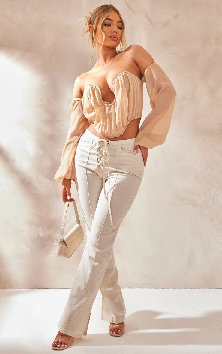 Amber Jepson featured in  the PrettyLittleThing catalogue for Spring/Summer 2023