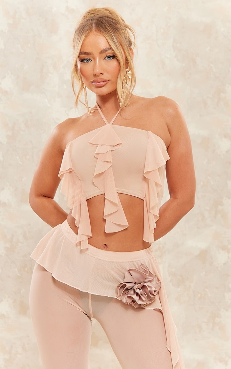 Amber Jepson featured in  the PrettyLittleThing catalogue for Spring/Summer 2023