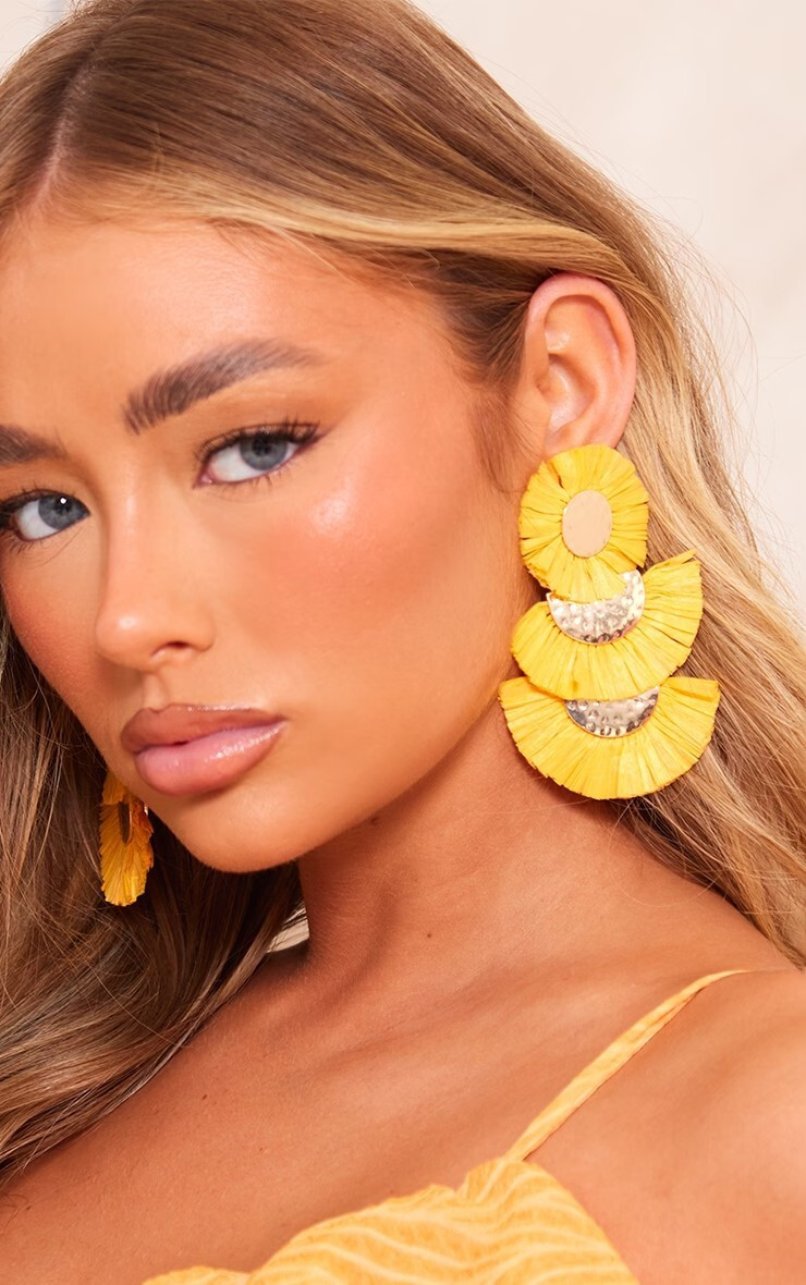 Amber Jepson featured in  the PrettyLittleThing catalogue for Summer 2023