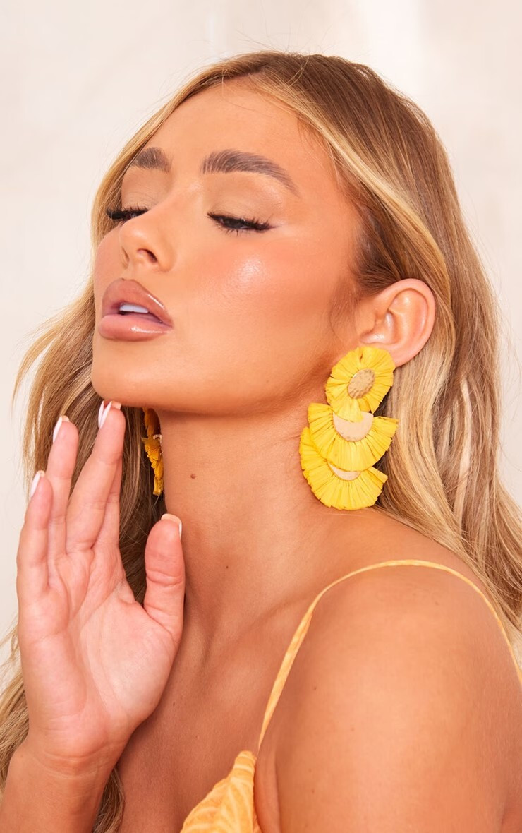 Amber Jepson featured in  the PrettyLittleThing catalogue for Summer 2023