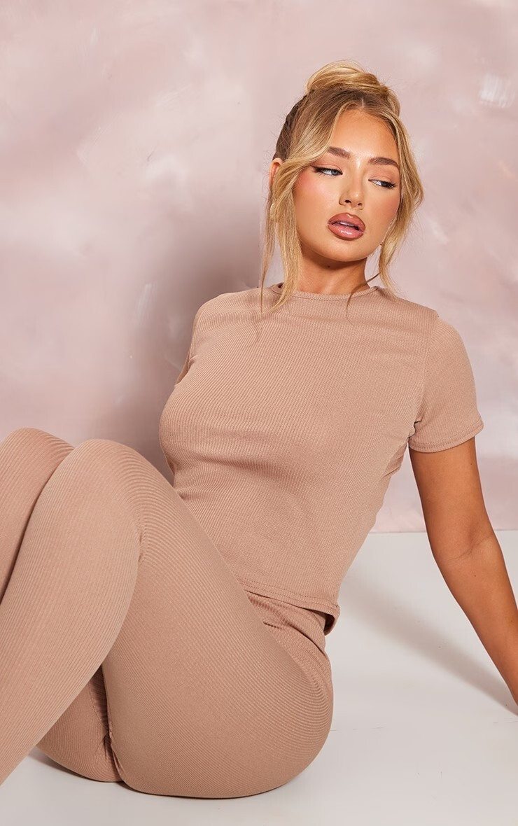 Amber Jepson featured in  the PrettyLittleThing catalogue for Summer 2023