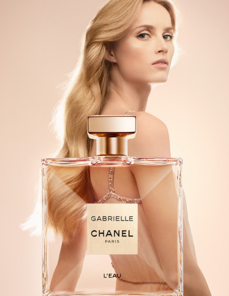 Rianne Van Rompaey featured in  the Chanel Parfums Gabrielle L\'Eau advertisement for Summer 2024