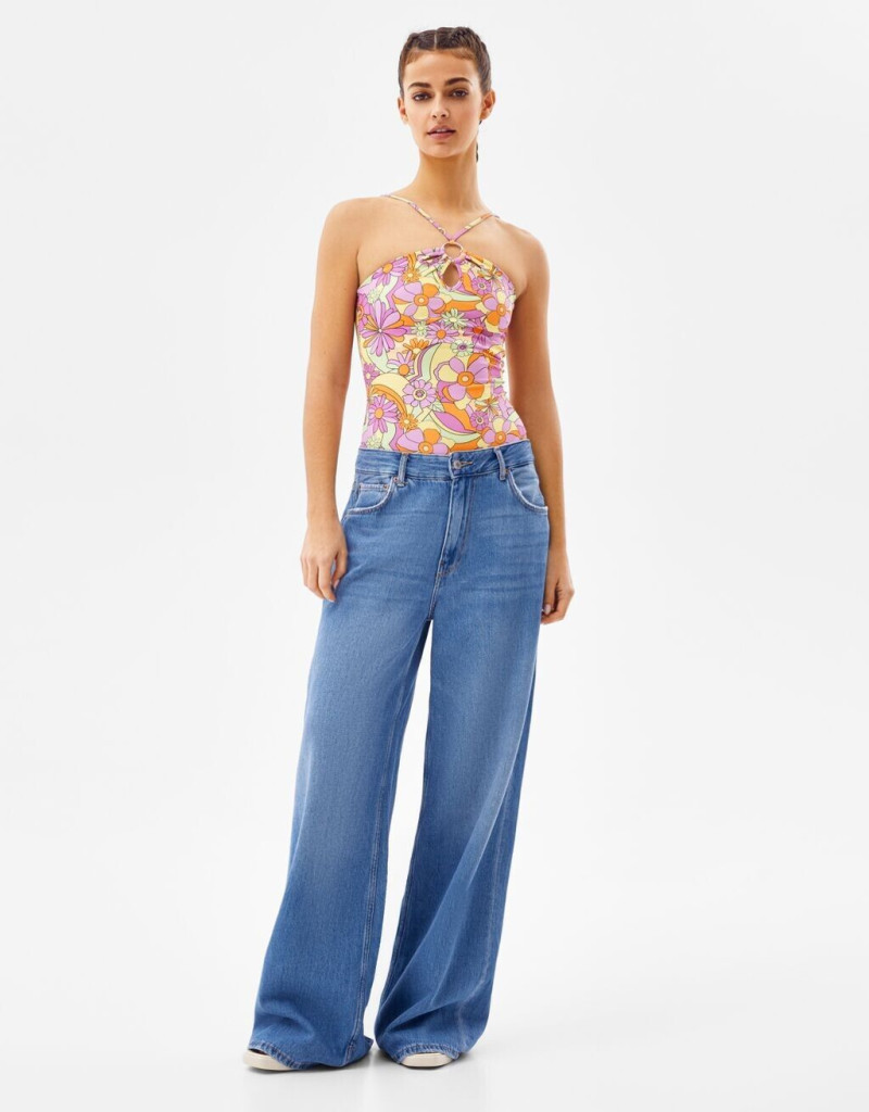 Marie Teissonniere featured in  the Bershka Rock Jeans catalogue for Spring/Summer 2022