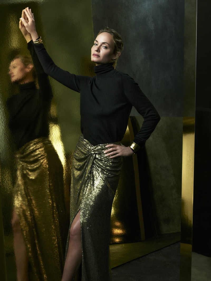 Amber Valletta featured in  the Donna Karan New York advertisement for Autumn/Winter 2024