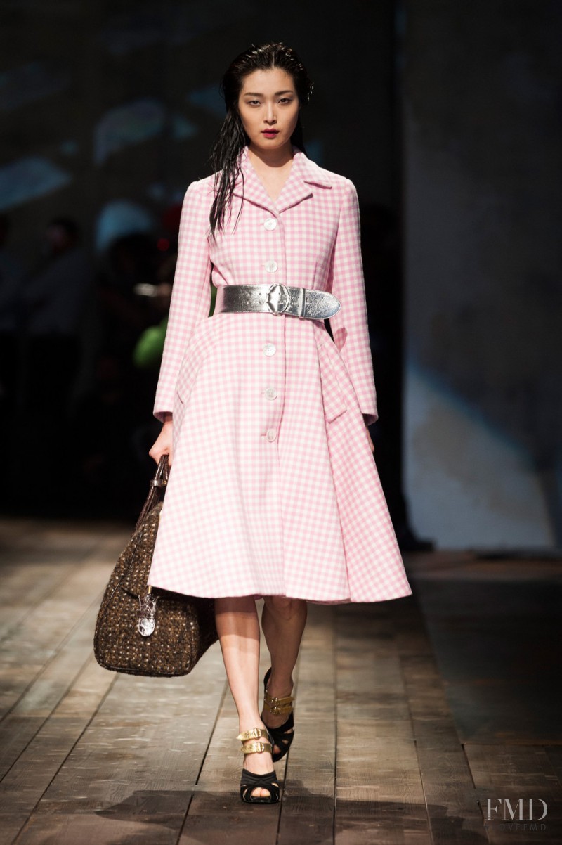Sung Hee Kim featured in  the Prada fashion show for Autumn/Winter 2013